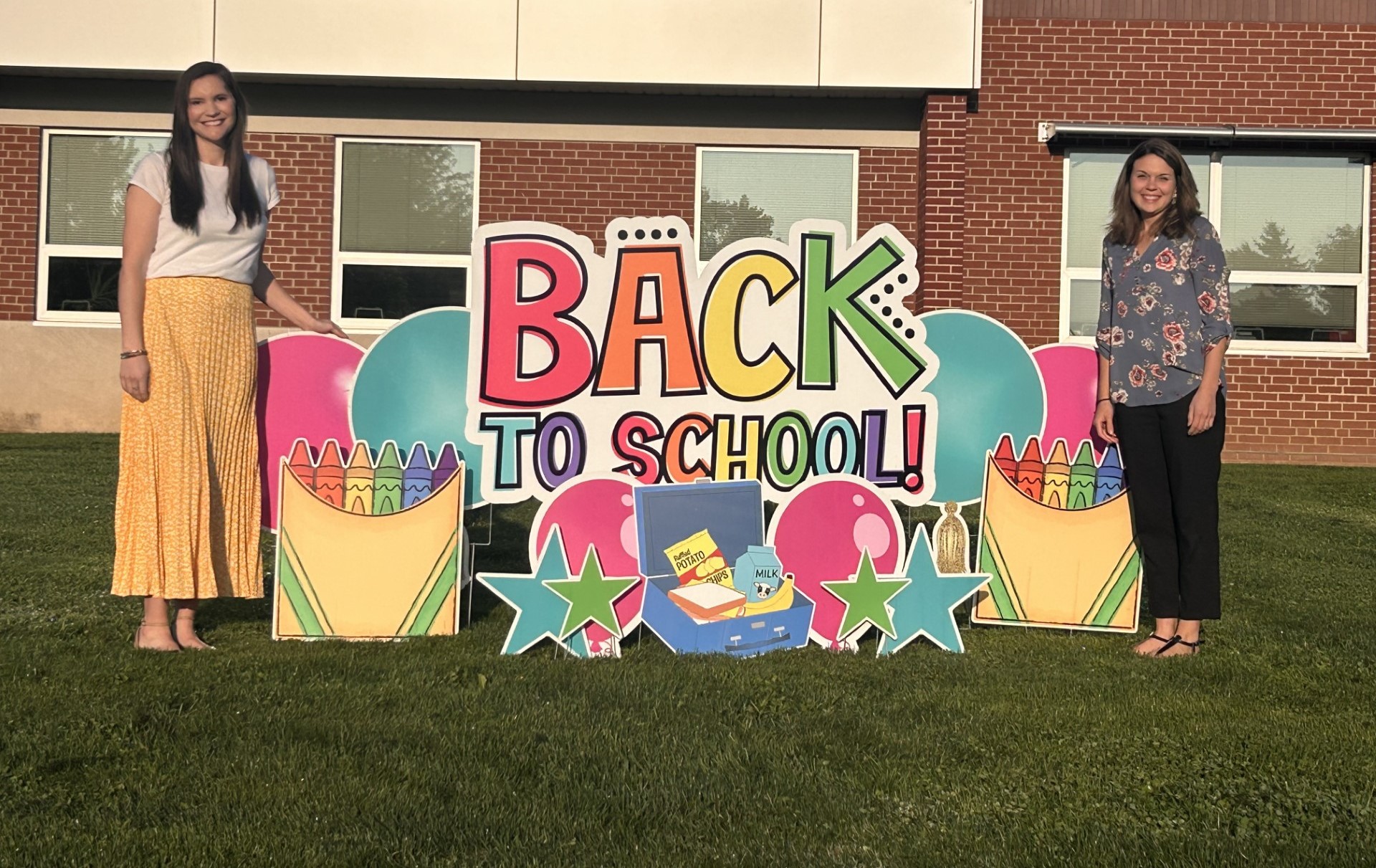 Ms. Schaffer, our 2-3 School Counselor, and Mrs. Workman, our K-1 School Counselor, prepare to greet students on the first day of school!