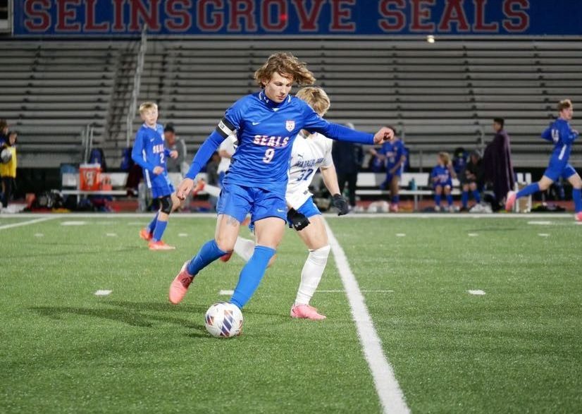 Senior Damien Pardoe Dribbles past Defender, Finishes Game against Warrior Run with 40 Career Goals & 10th in SAHS all-time Scoring List!