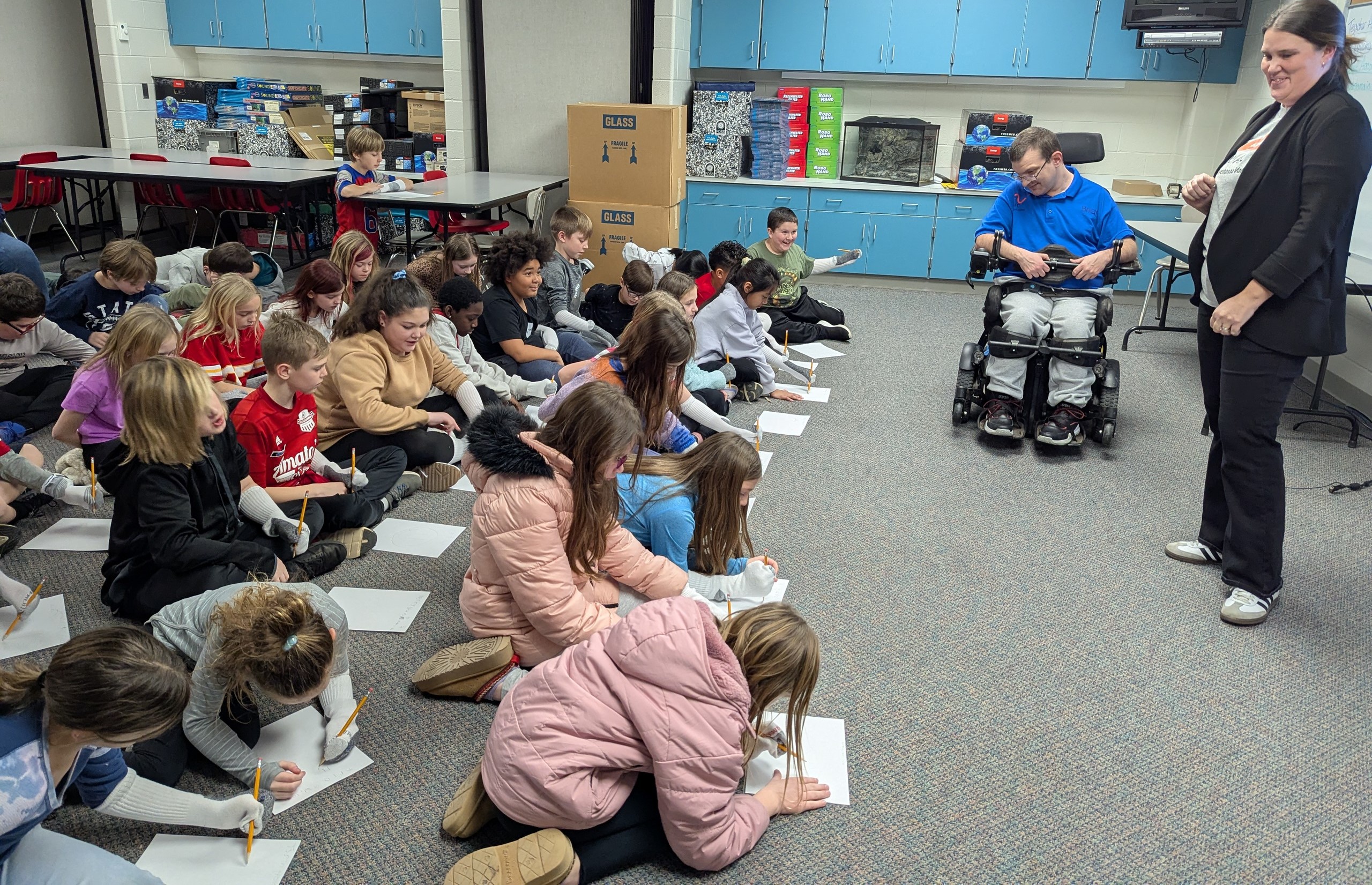 Mrs. Moore & Mr. Hebermehl from ARC taught 4th graders about disabilities.