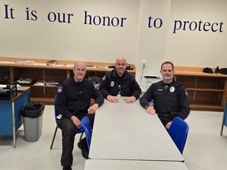 Police Officers pictured are (L to R): Officer Ryan Maxwell, Chief Troy Hickman, and Officer Paul Mall.